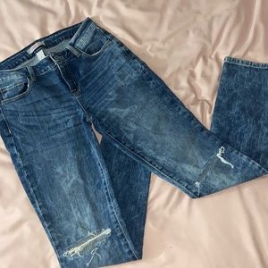 Distressed boyfriend style skinny jeans